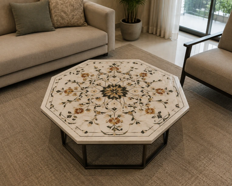 An octagonal marble inlay coffee table with a symmetrical, Mughal-inspired geometric design, positioned in a minimalist, modern living room.